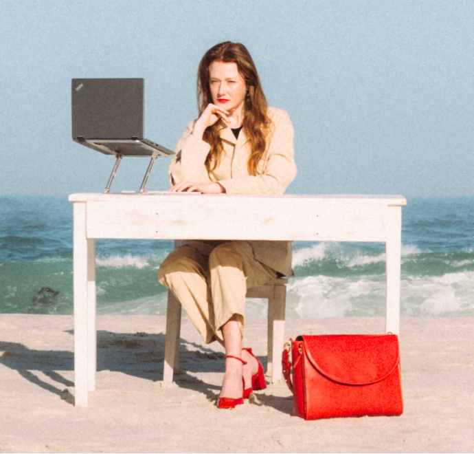 Graphic depicting a mountain peak at sunset cropped in a circle with the words RANGE CRAZY above and below.