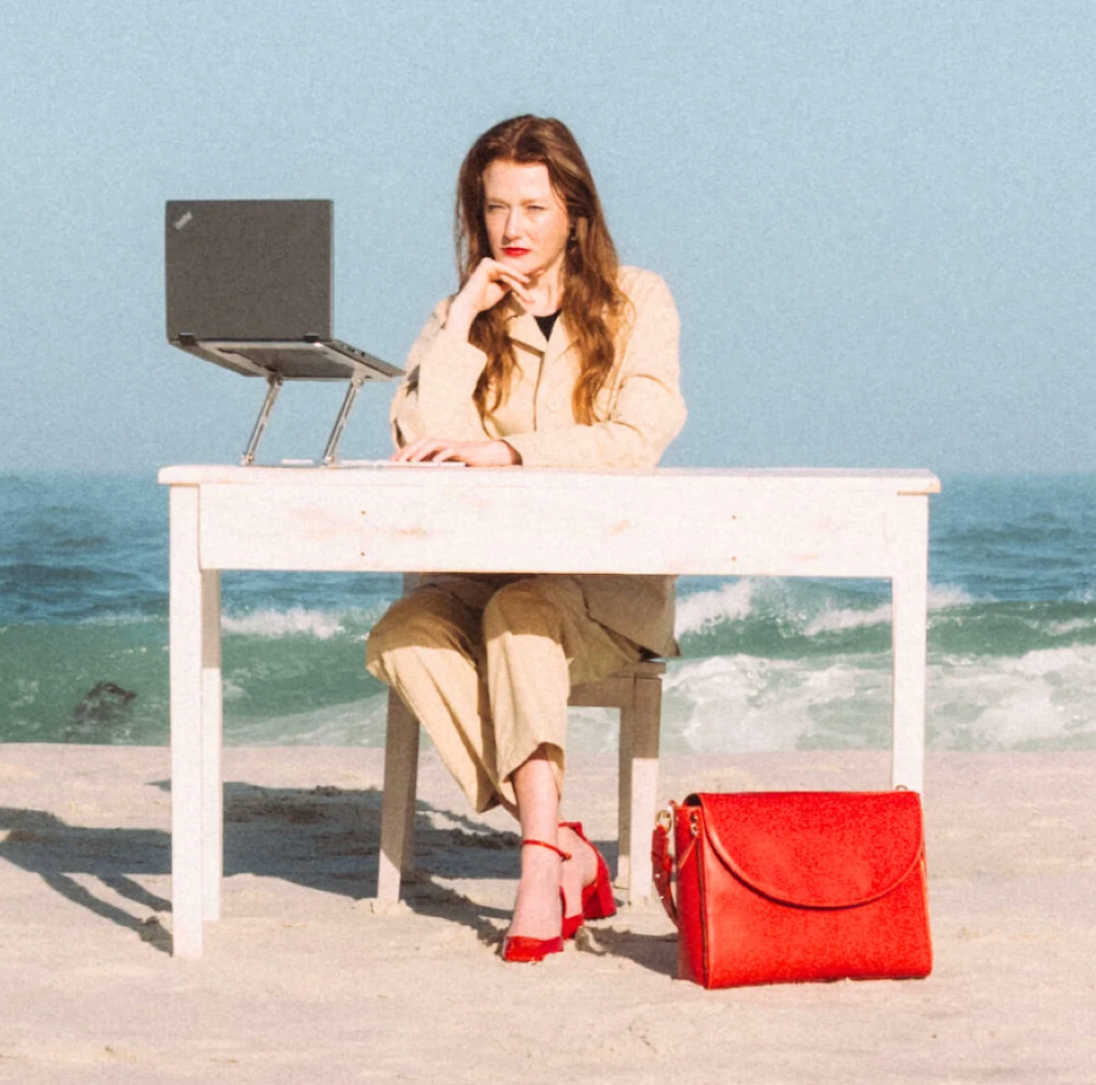 Graphic depicting a mountain peak at sunset cropped in a circle with the words RANGE CRAZY above and below.