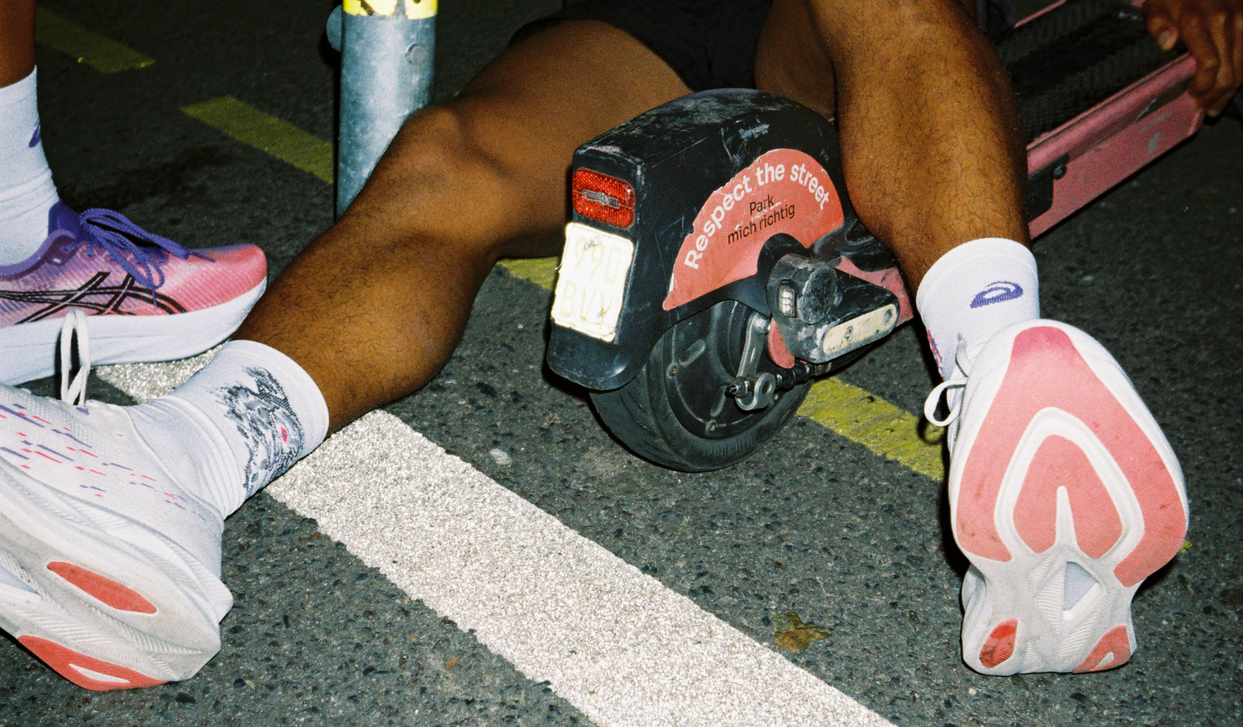 Graphic depicting a mountain peak at sunset cropped in a circle with the words RANGE CRAZY above and below.